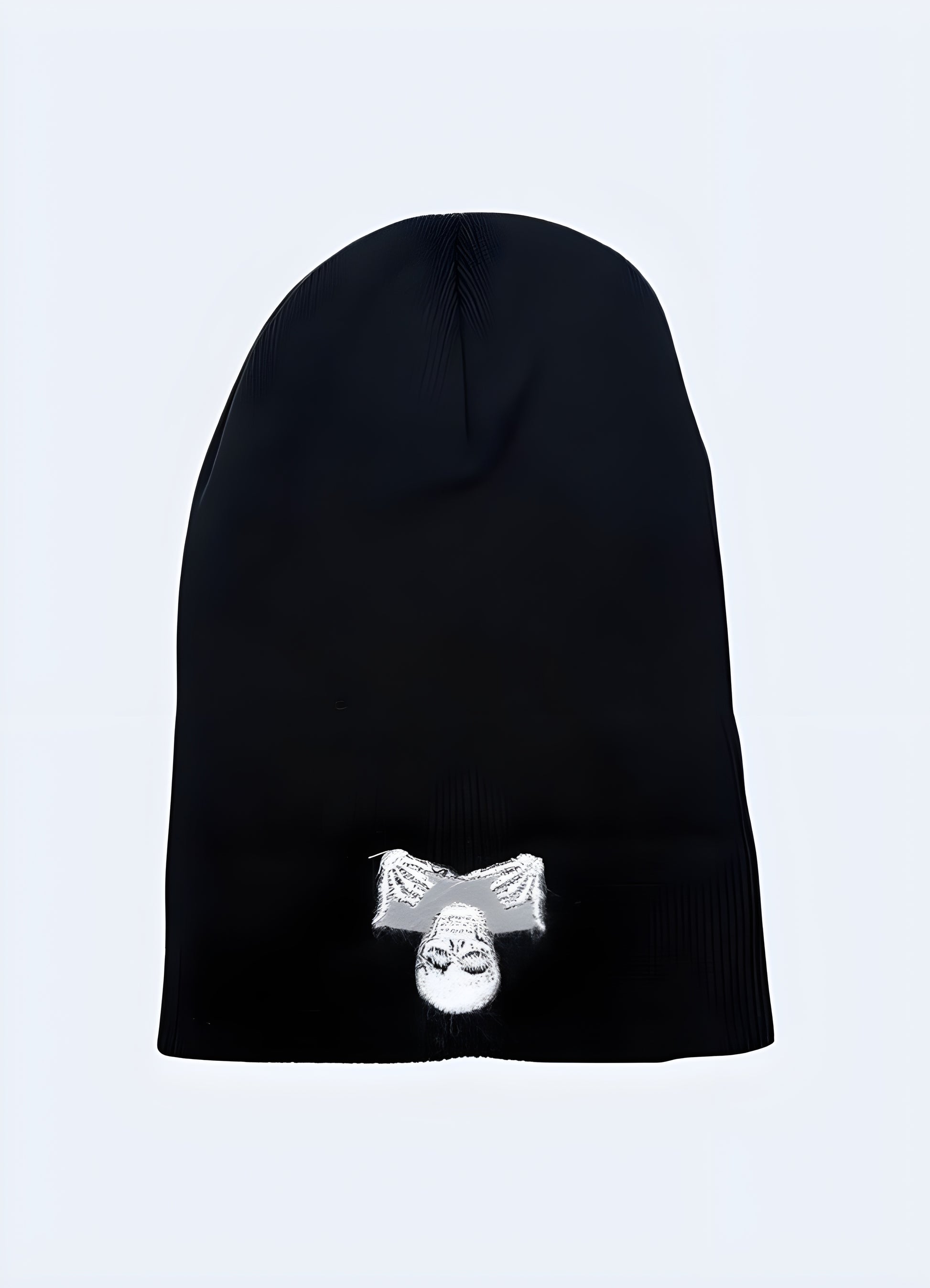 It's a cool beanie that demands attention, instantly adding a touch of sophistication and substance to your outfit.