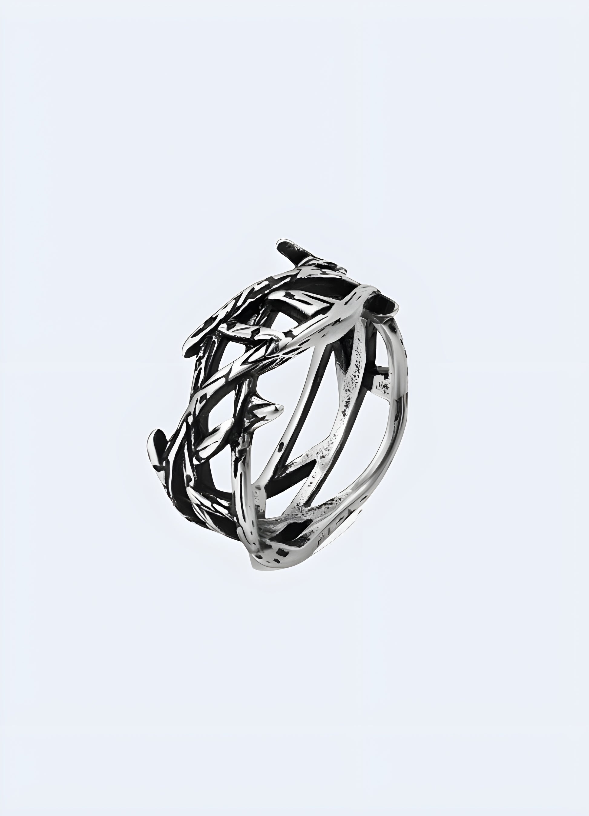 Oxidized brass textured metal branch ring.