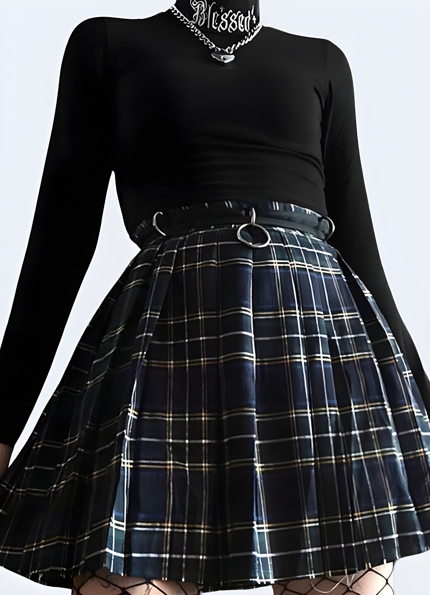One of the standout features of this crop top is the beautifully embroidered word "blessed" on the turtleneck.