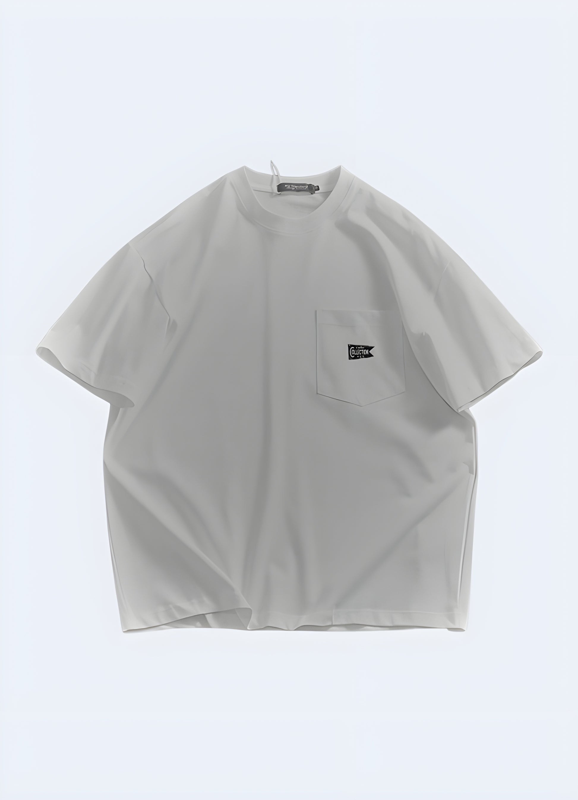 Japanese oversized shirt in white, front view, highlighting the minimalist design and loose fit for a modern streetwear look in the AU.