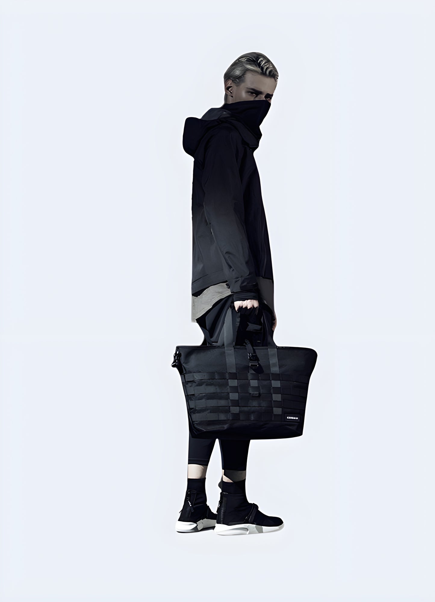 Dual shoulder straps water-resistant tech tote zipper closure.