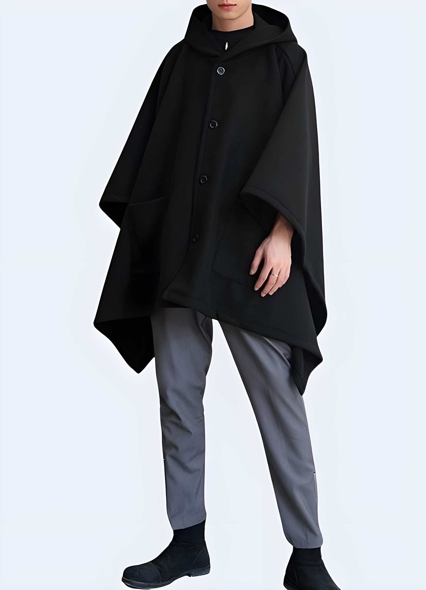 Tailored for both black hooded poncho with pockets.