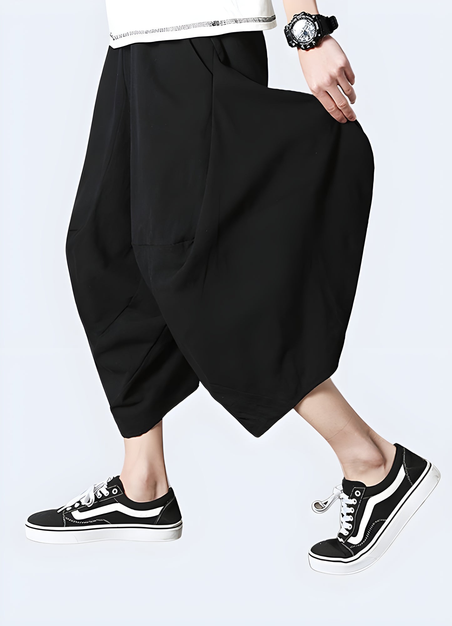 Men wearing  japanese inspired harem black pants side view.