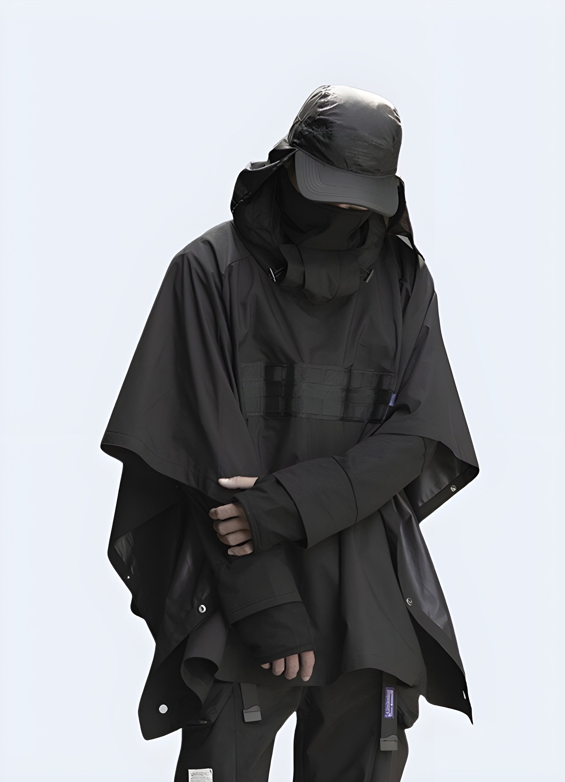The tactica cloak two oversized pockets with snap flaps.