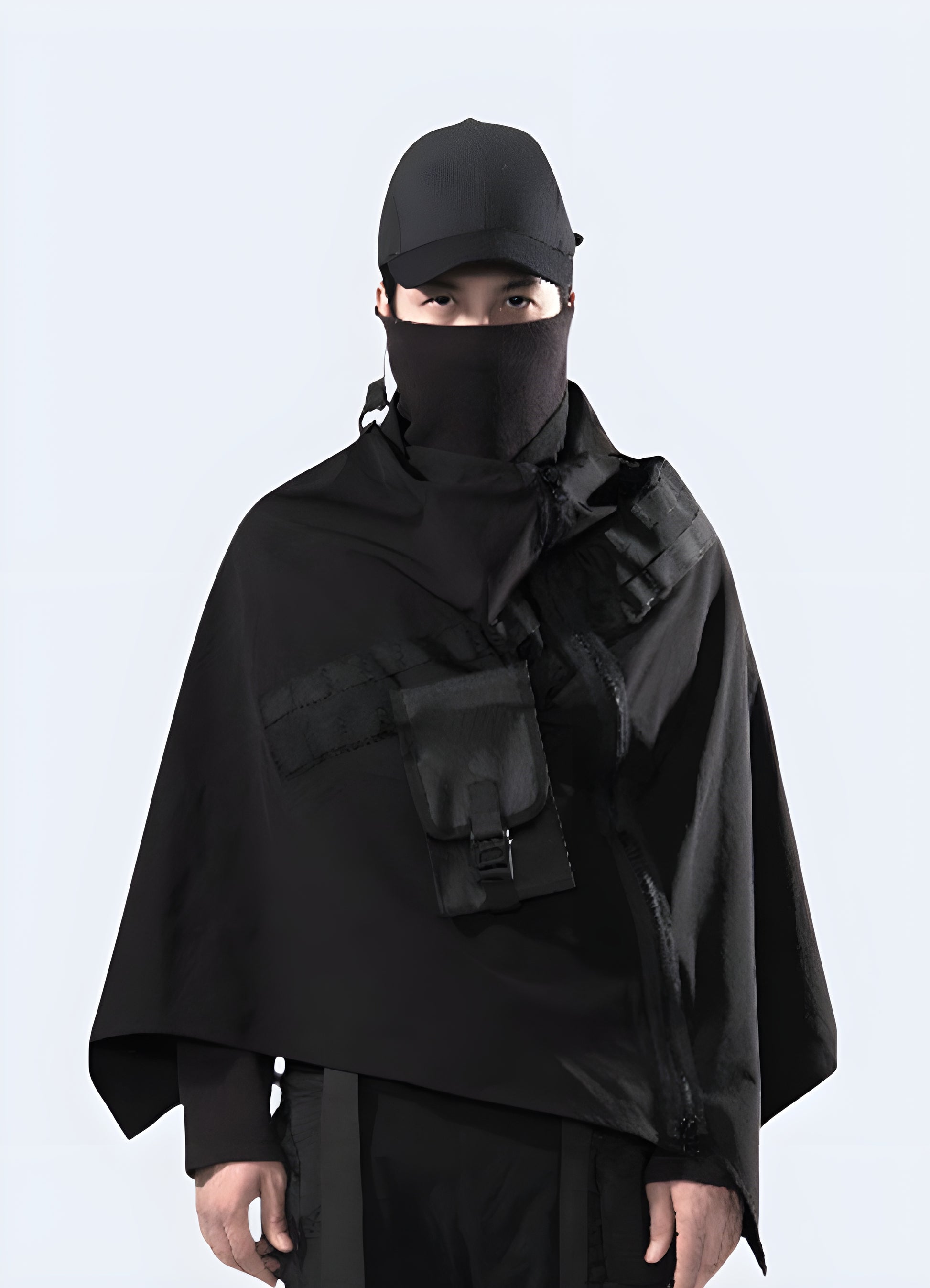Urban streetstyle with utilitarian details techwear cloak.