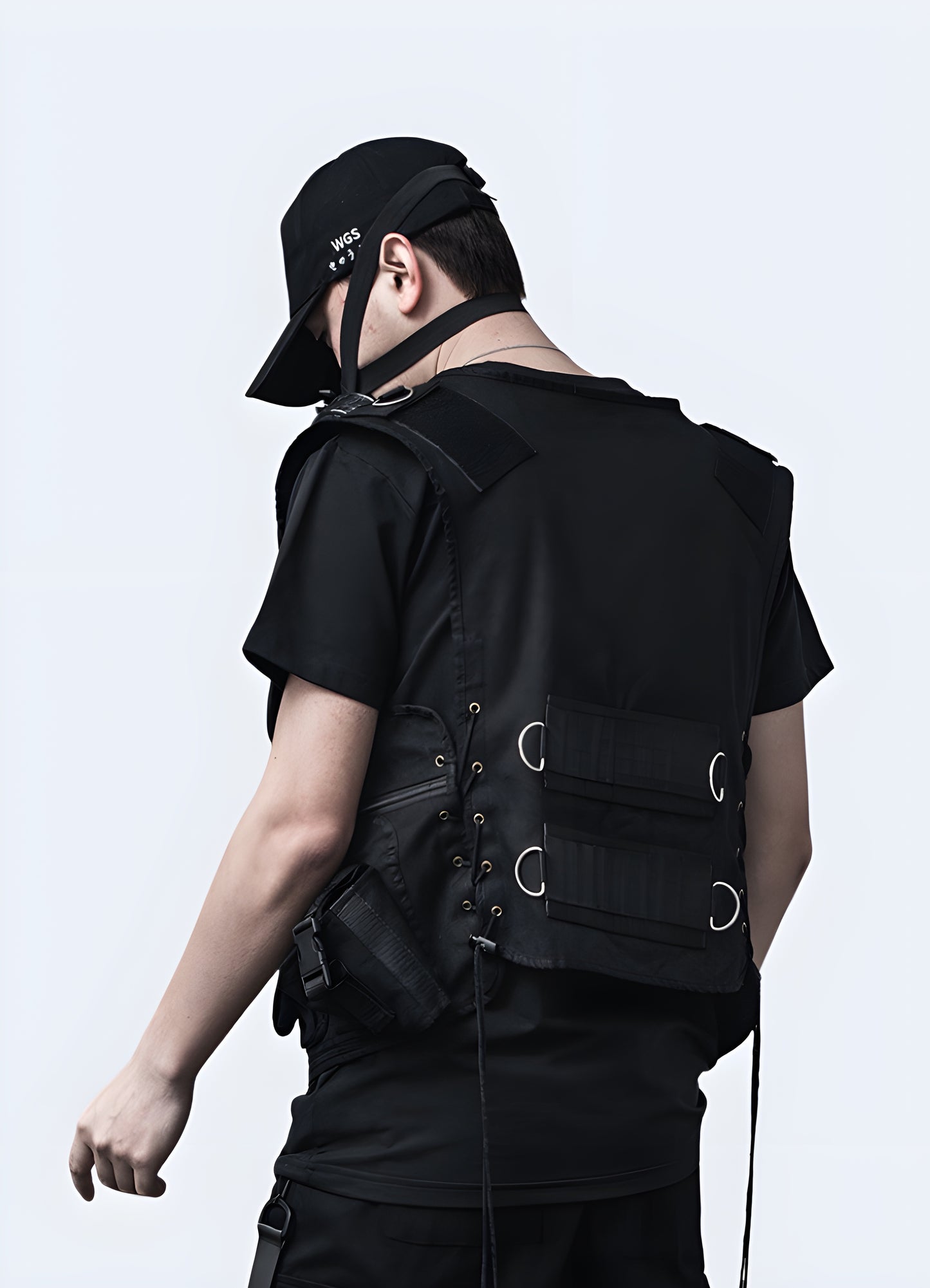 Men wearing black futuristic techwear vest back view.