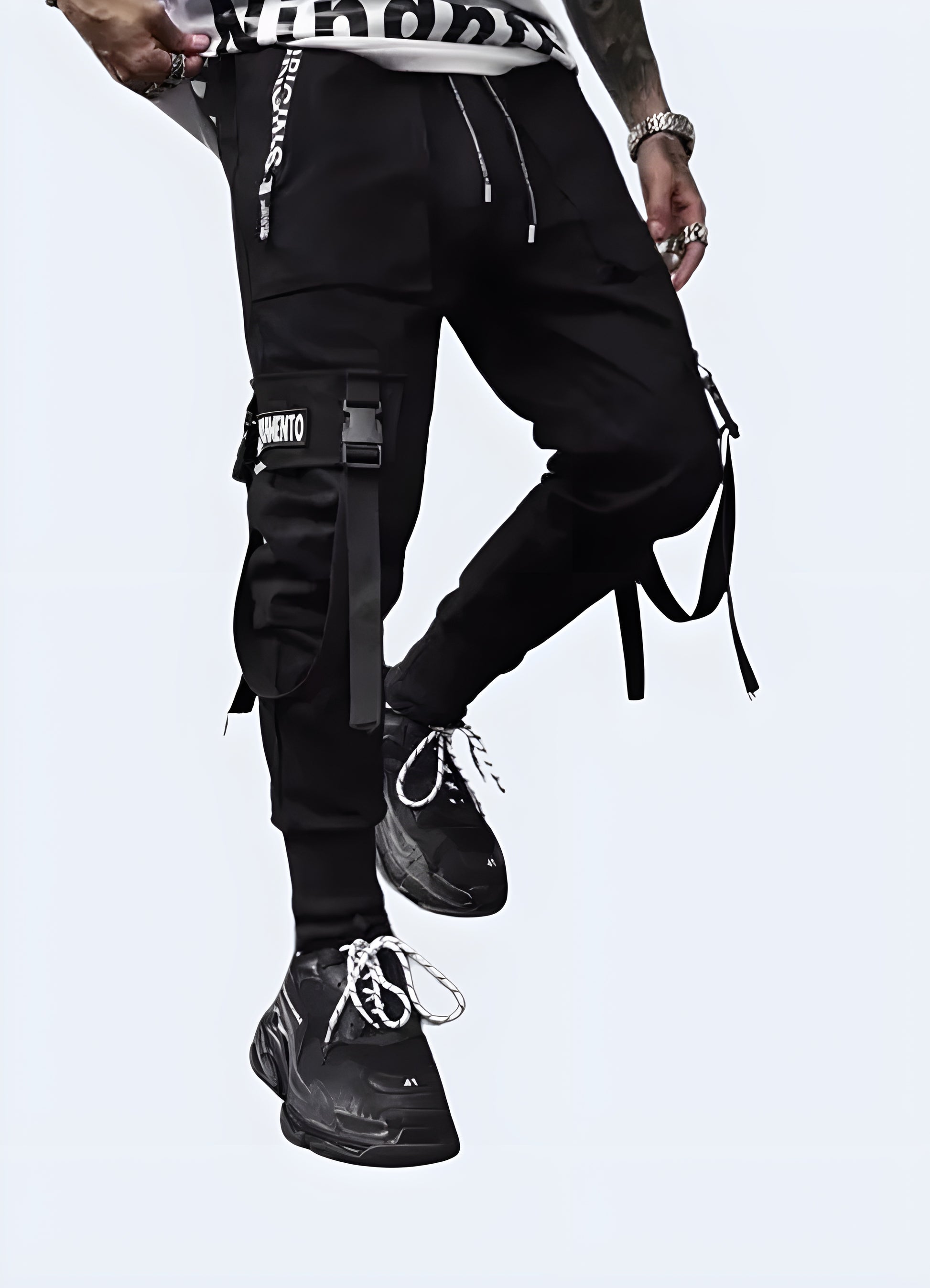 The pants are characterized by their distinctive style elements such as a high-rise waistband, loose legs, and a slightly cropped hem that reveals the ankles.