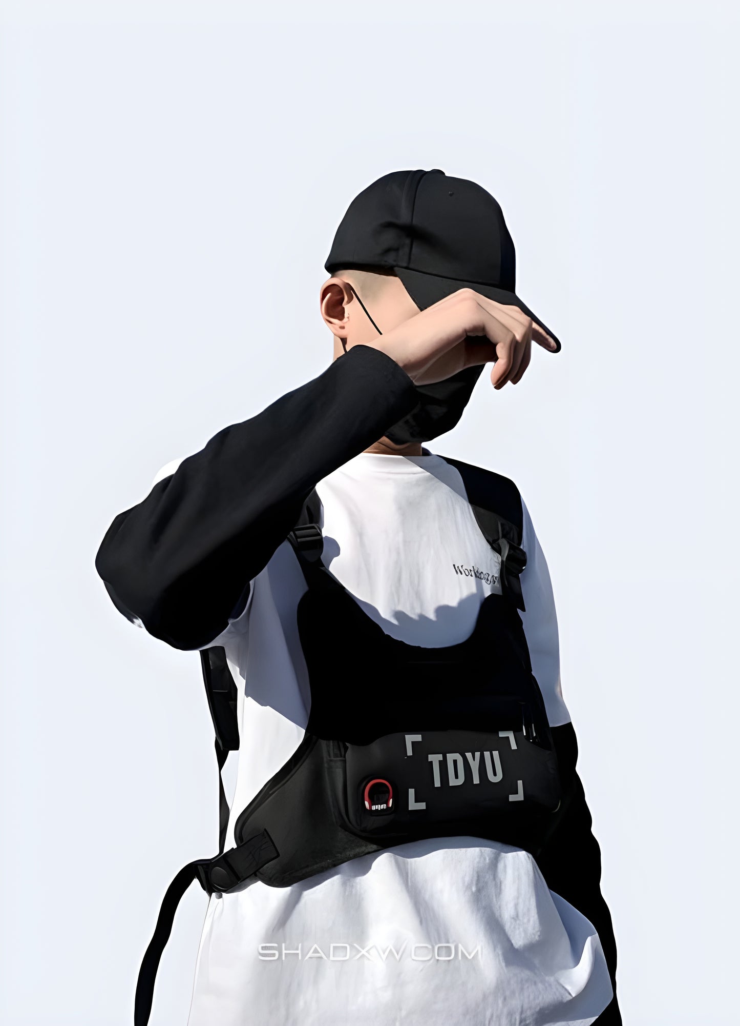 Multi-compartment over-the-chest bag keeps your essentials secure and accessible.