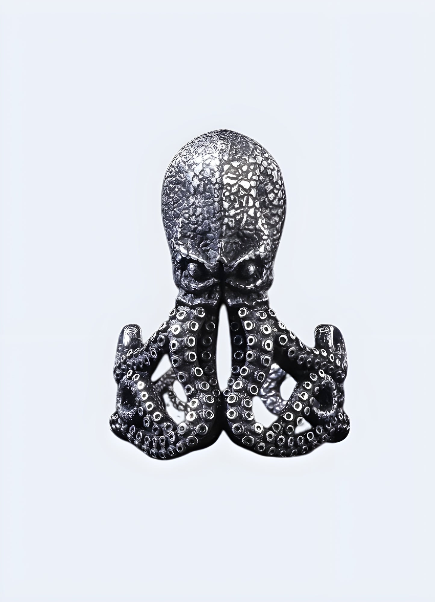 Octopus motif oxidized brass ring.