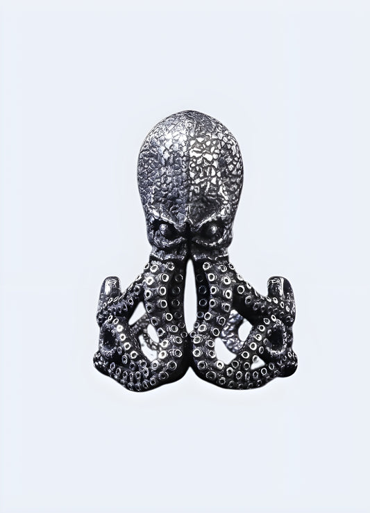 Octopus motif oxidized brass ring.