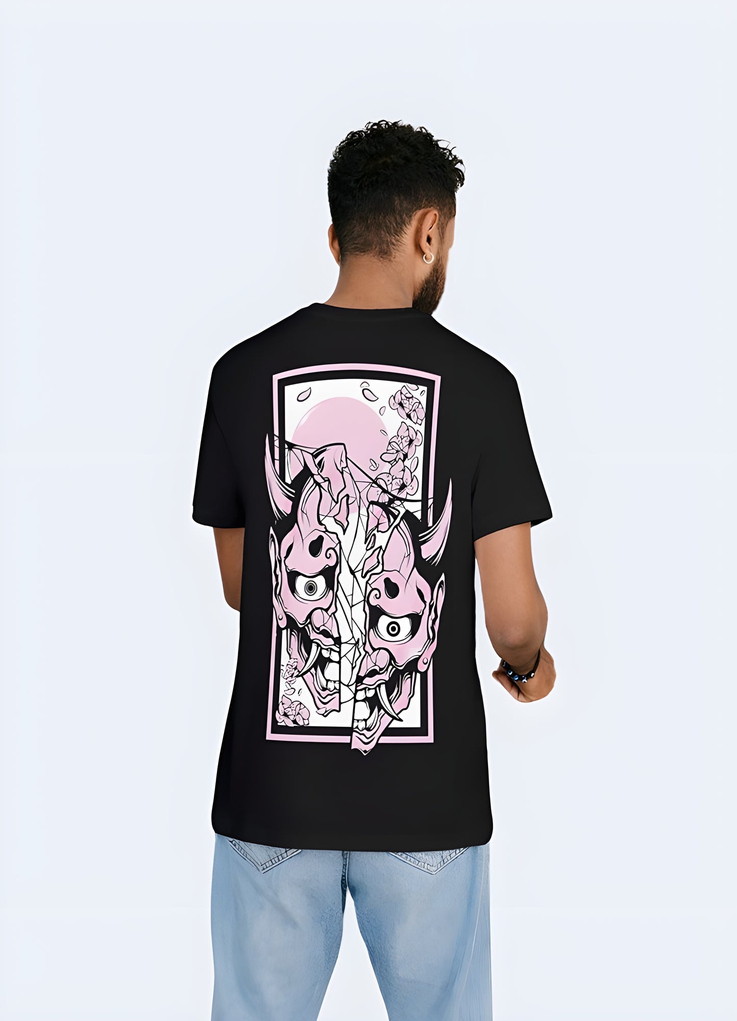 Embrace the duality of strength and mischief with this pink demon  oni tee.