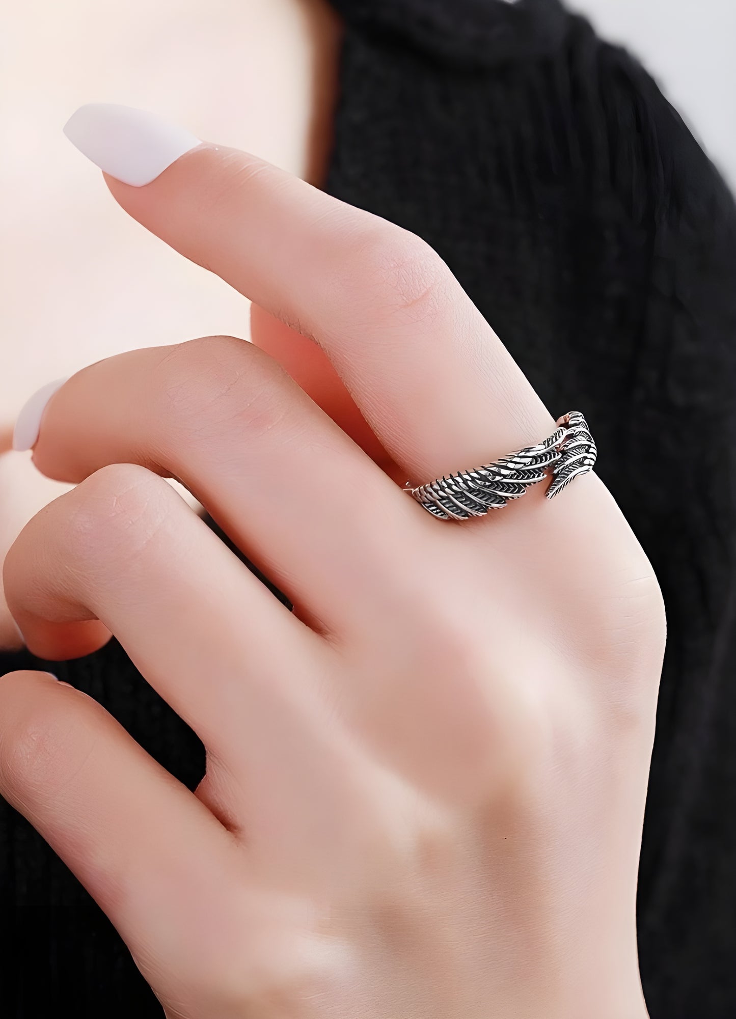 The intricate feather design is a testament to the beauty and grace of angels.