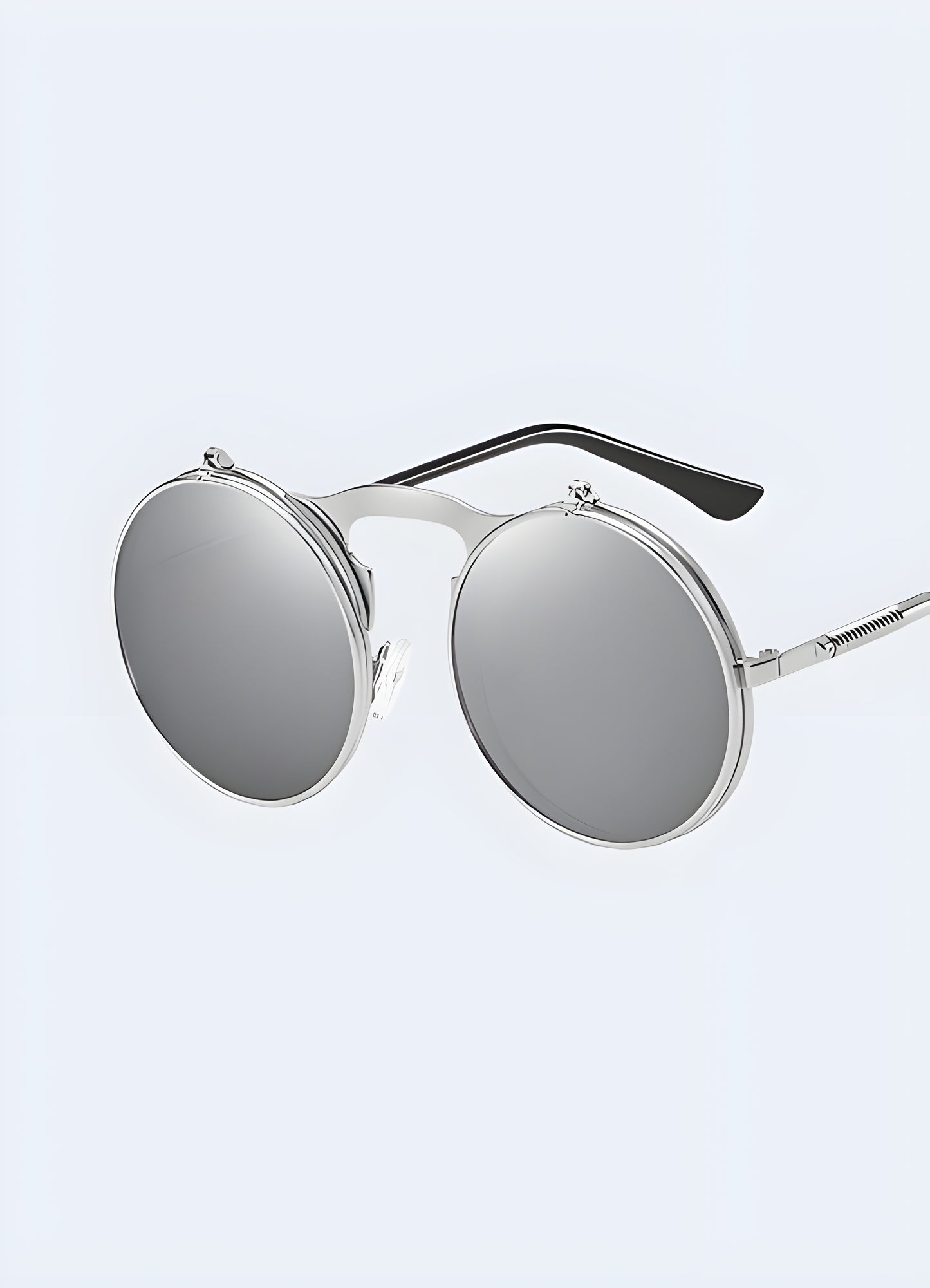 Appreciate the intricate details of these sunglasses, from the etched designs to the unique frame shape.