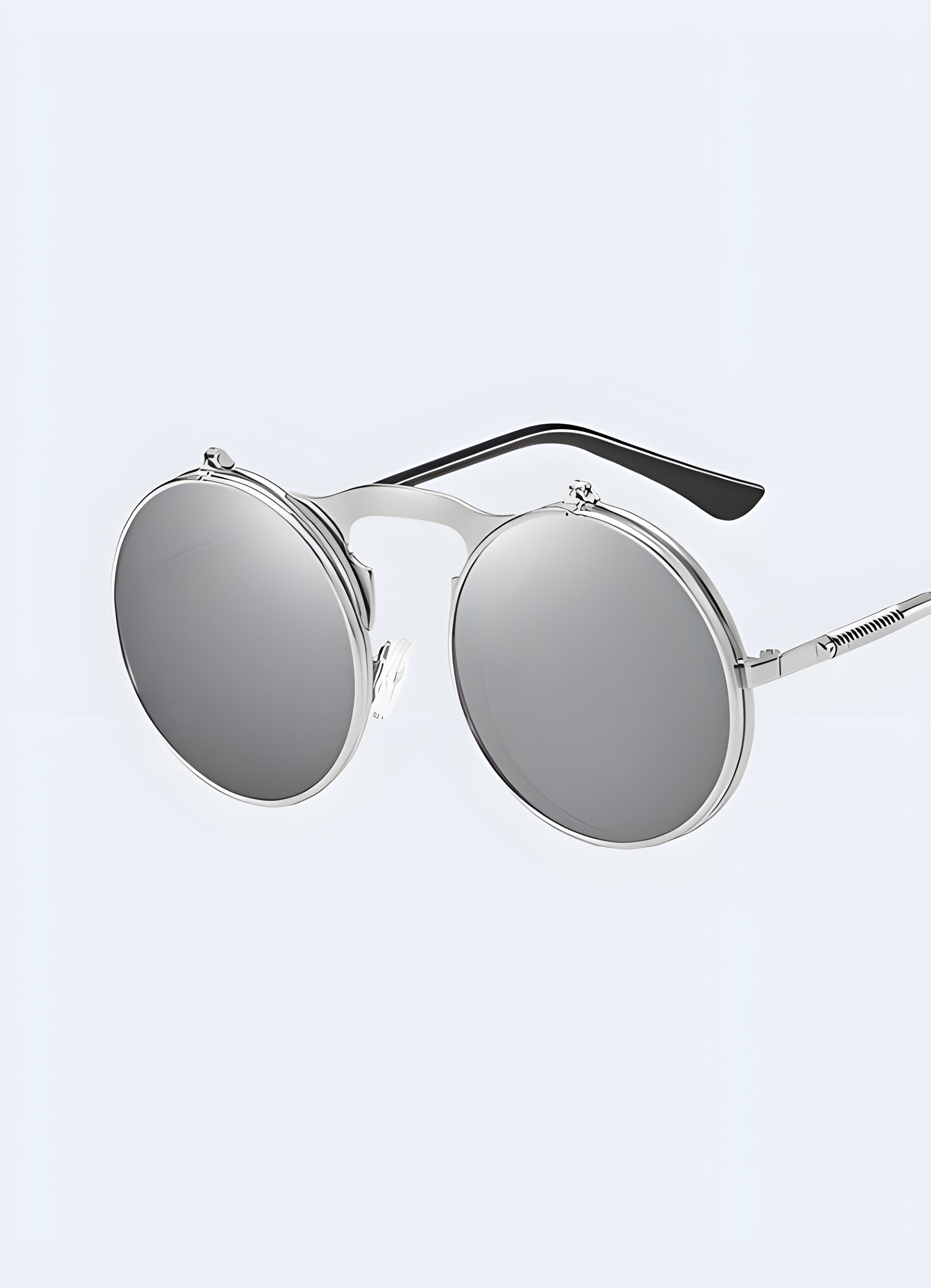 Appreciate the intricate details of these sunglasses, from the etched designs to the unique frame shape.