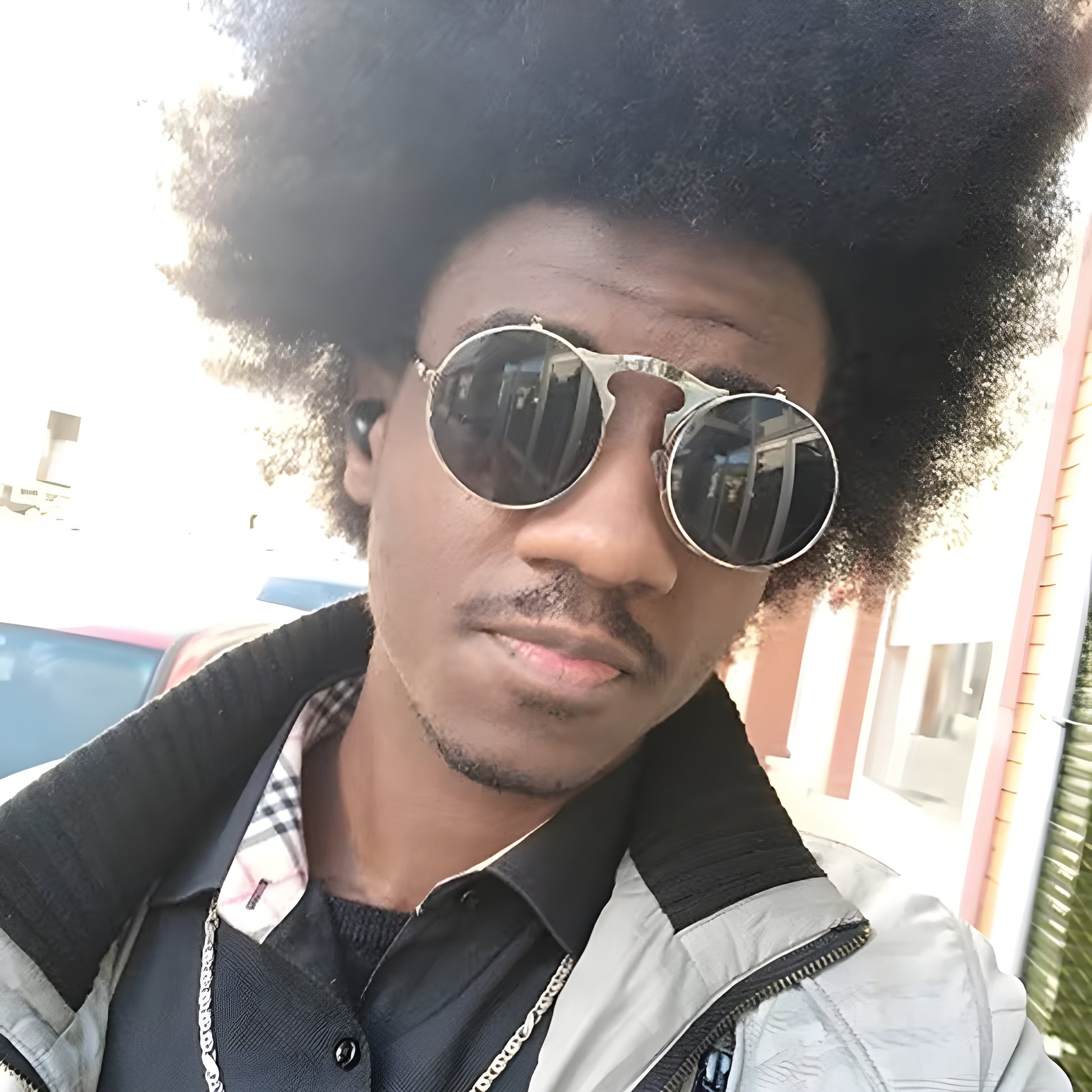 Appreciate the intricate details of these sunglasses, from the etched designs to the unique frame shape.