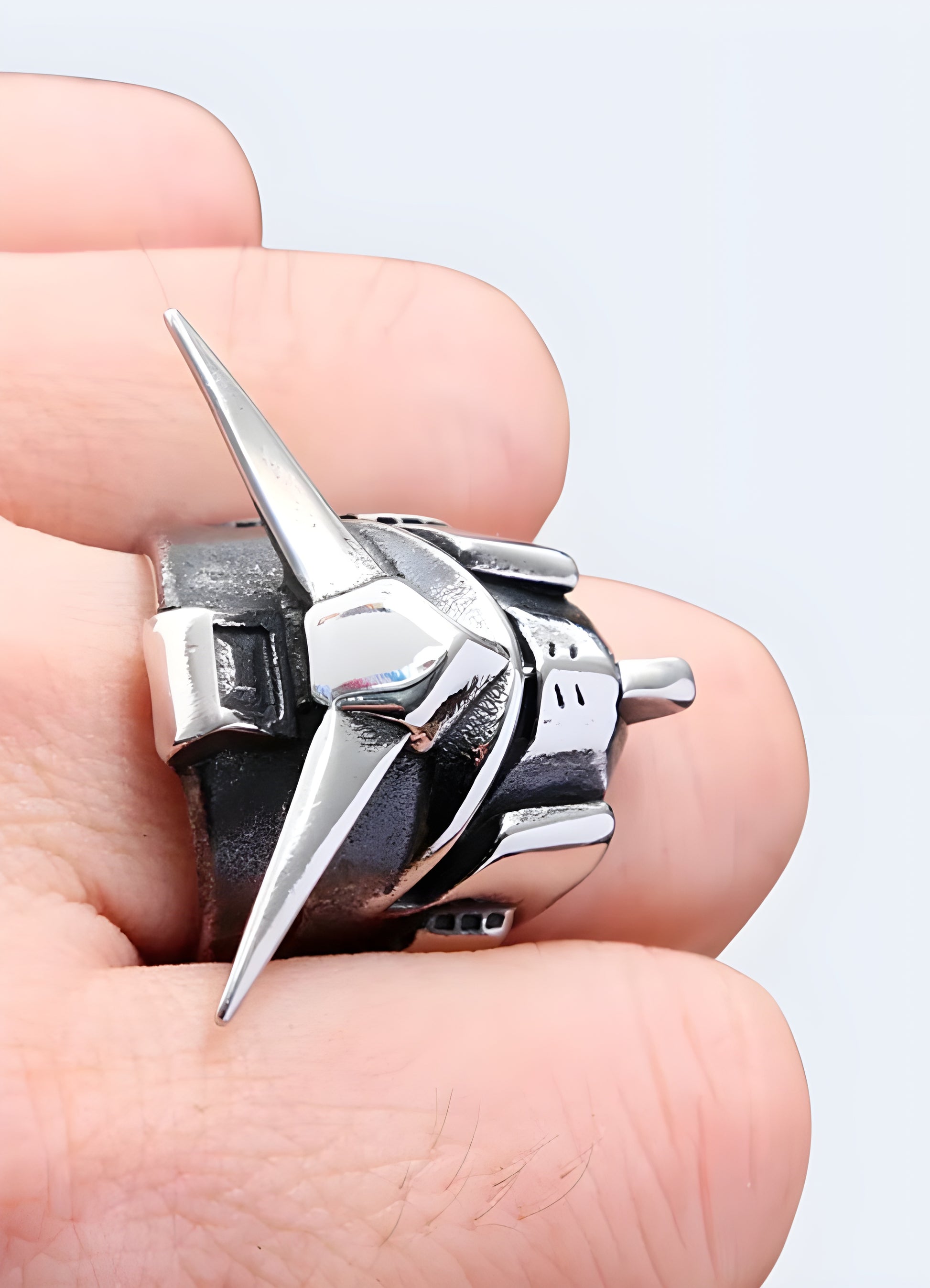 The gundam ring stands out as an emblem of where techwear converges with the evocative narrative of cyberpunk.