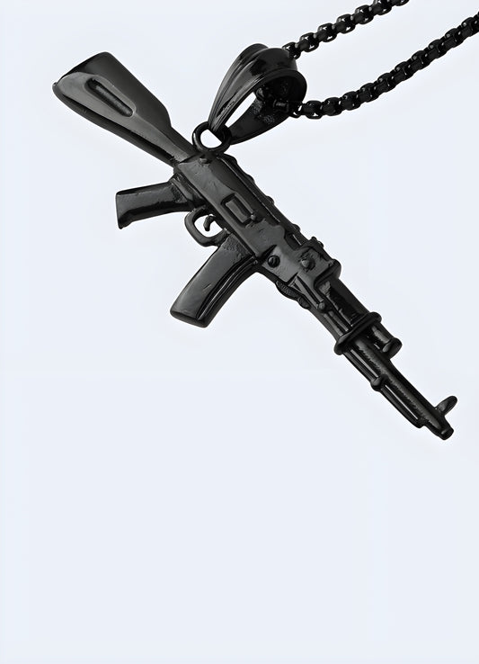 Aggressive AK-47 rifle pendant black oxide coated stainless steel.