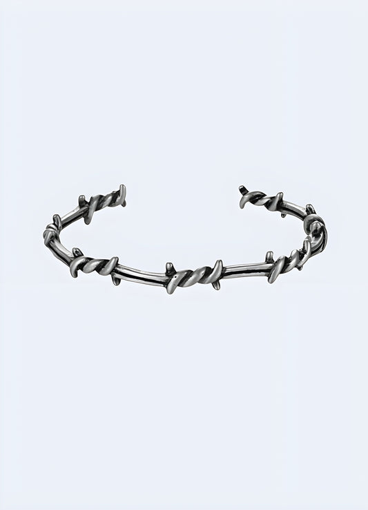 Edgy barbed wire design bangle front view.