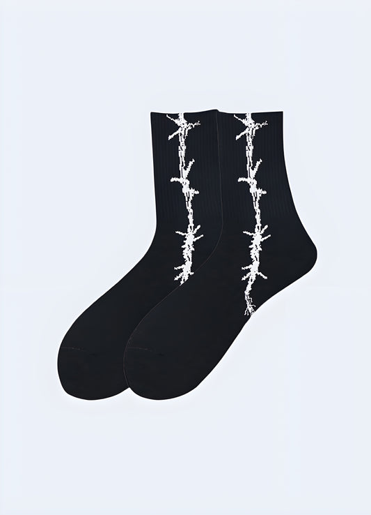 Black barbed wire socks, side view. Stylish and edgy footwear for a bold statement.