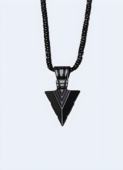 Stone arrowhead pendant black necklace.