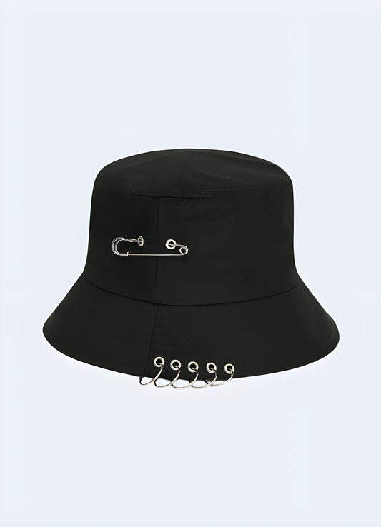 Silver ring and chain accents black bucket hat with rings.