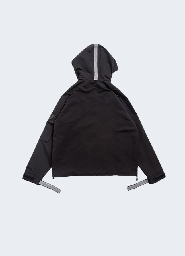 Black techwear jacket back view.