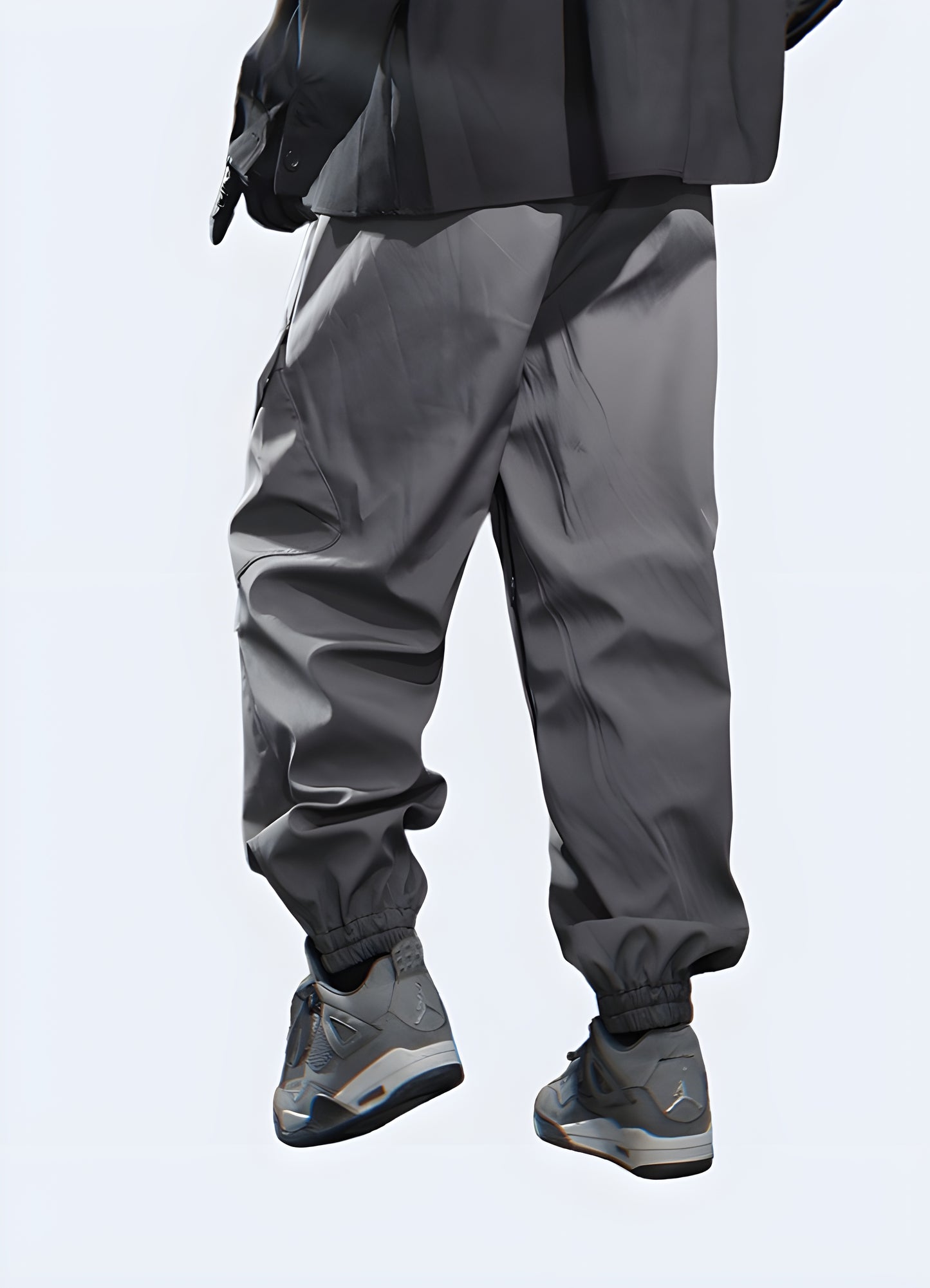 Dark grey cargo pants, back view, urban techwear style.