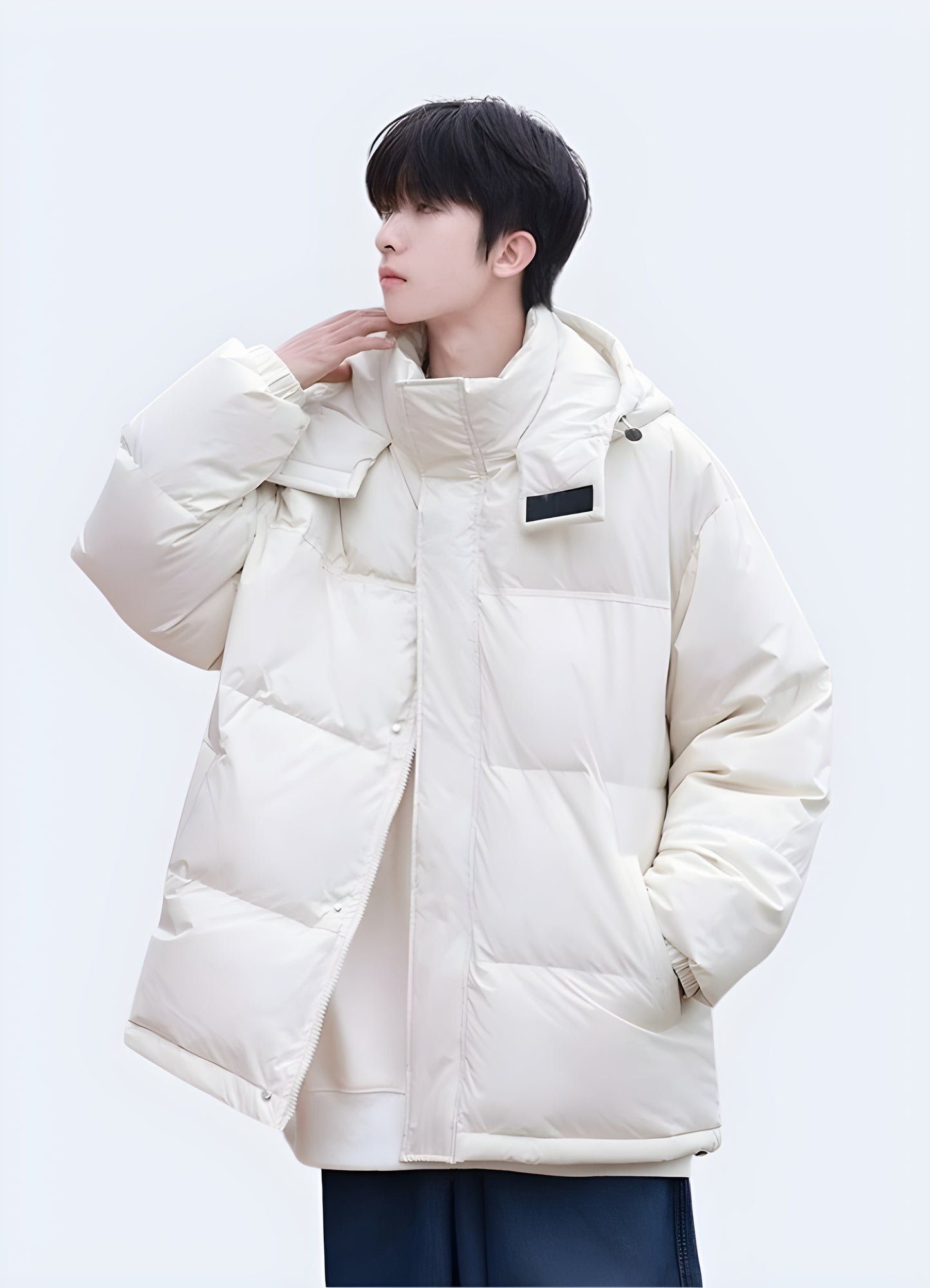Oversized streetwear puffer jacket white front view.