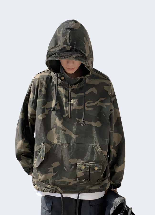 Embrace the urban jungle in this versatile camouflage cargo jacket.