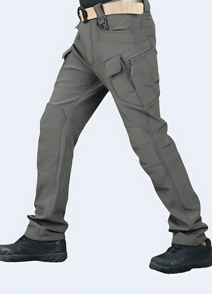 Gorpcore pants grey front side view man wearing.