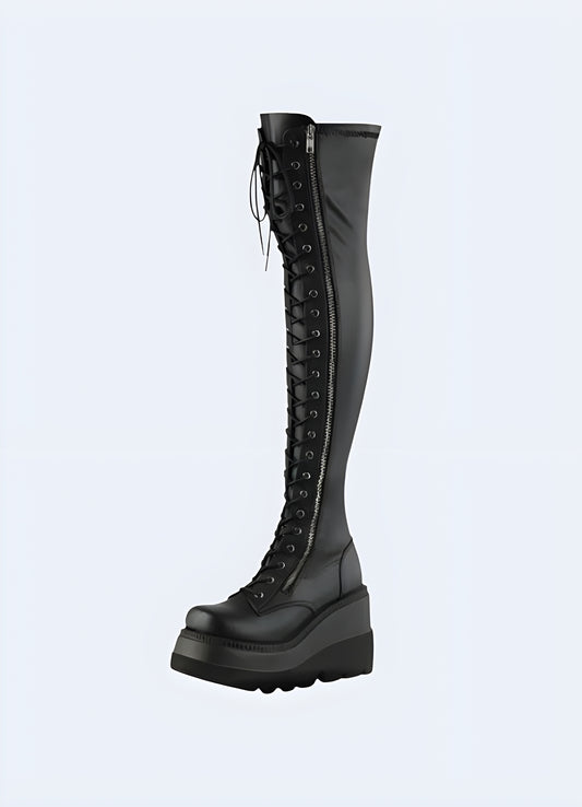 The knee-high design ensures that your legs are encased in a luxurious material, exuding an aura of dark allure.