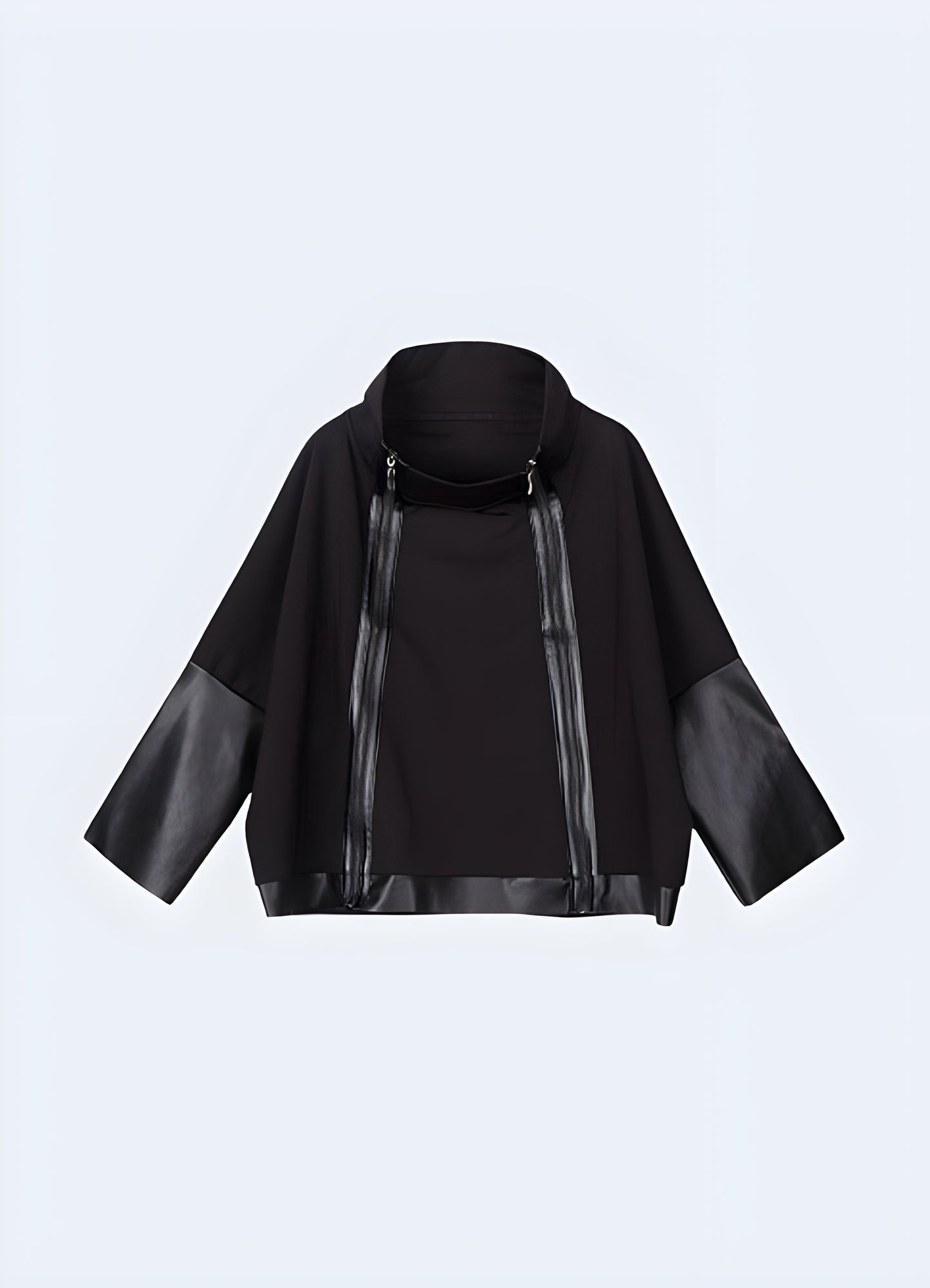 Hip length cut flatters feminine shape high collar jacket.