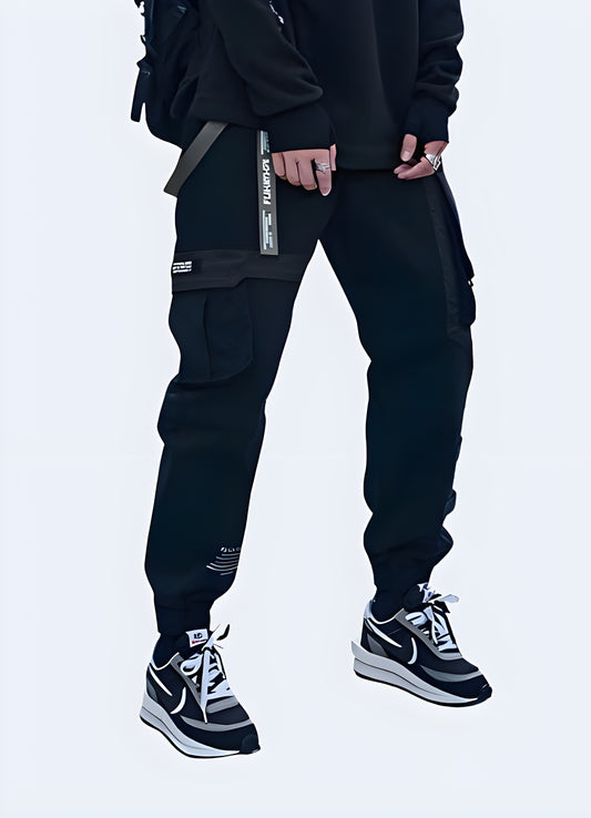 Drawstring closure baggy techwear pants black.