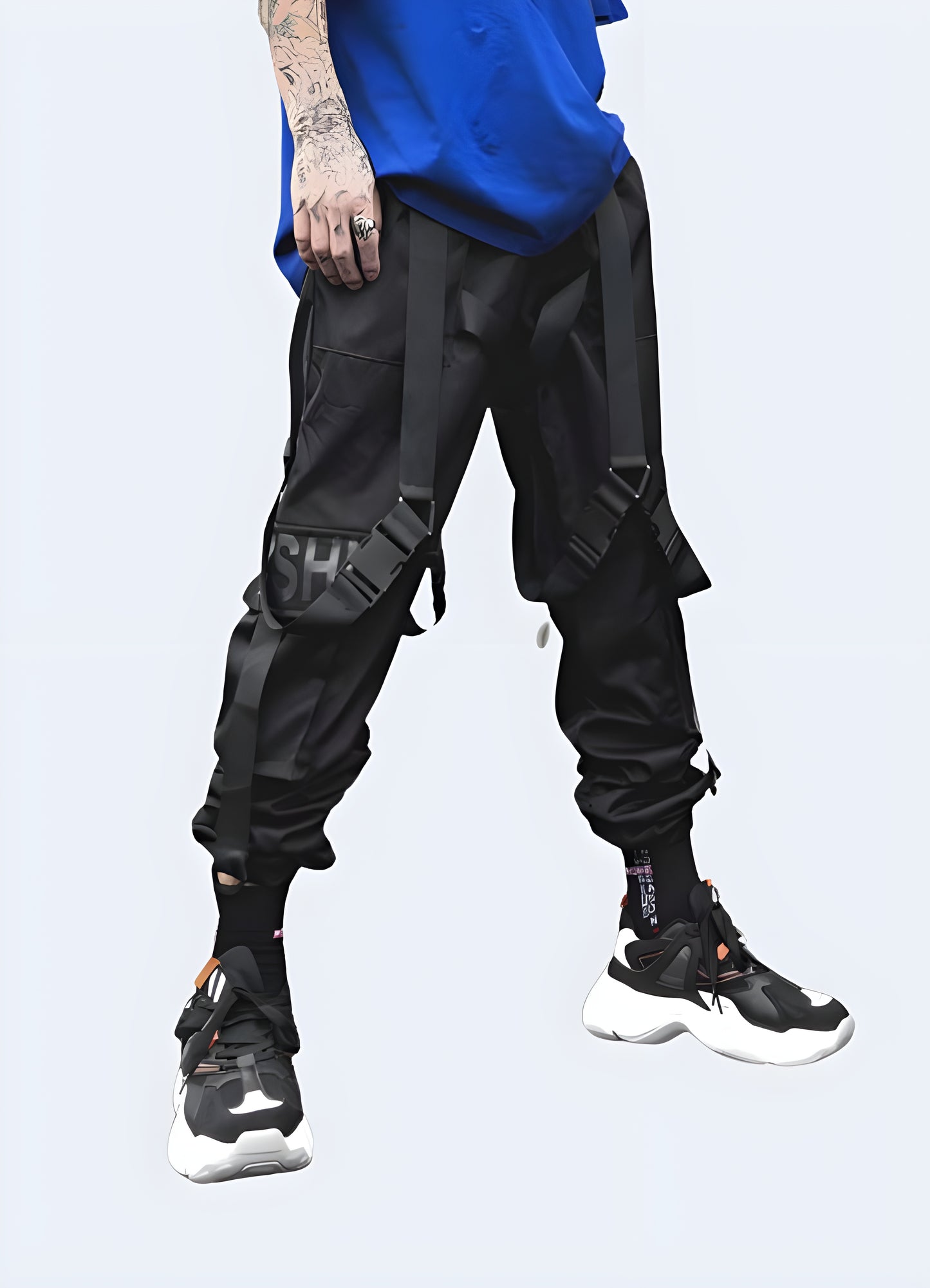 Multiple pockets and zippers on the side black jogger cargo pants.