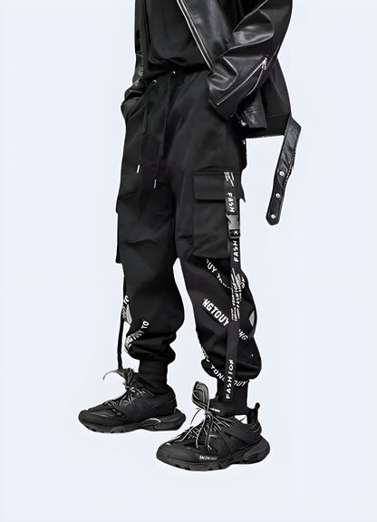 Futuristic black techwear cargo pants adjustable straps.