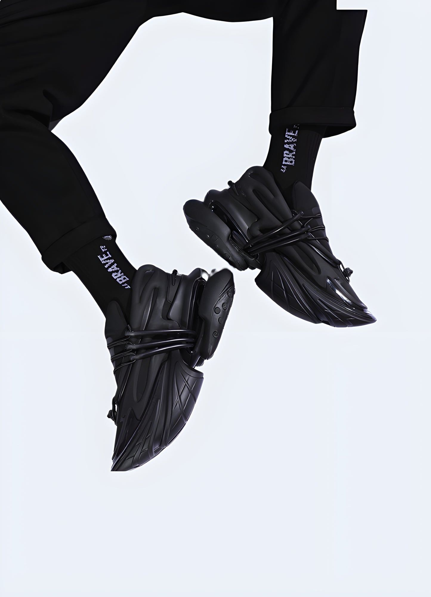 These shoes feature a sleek, minimalist design with a black color scheme.