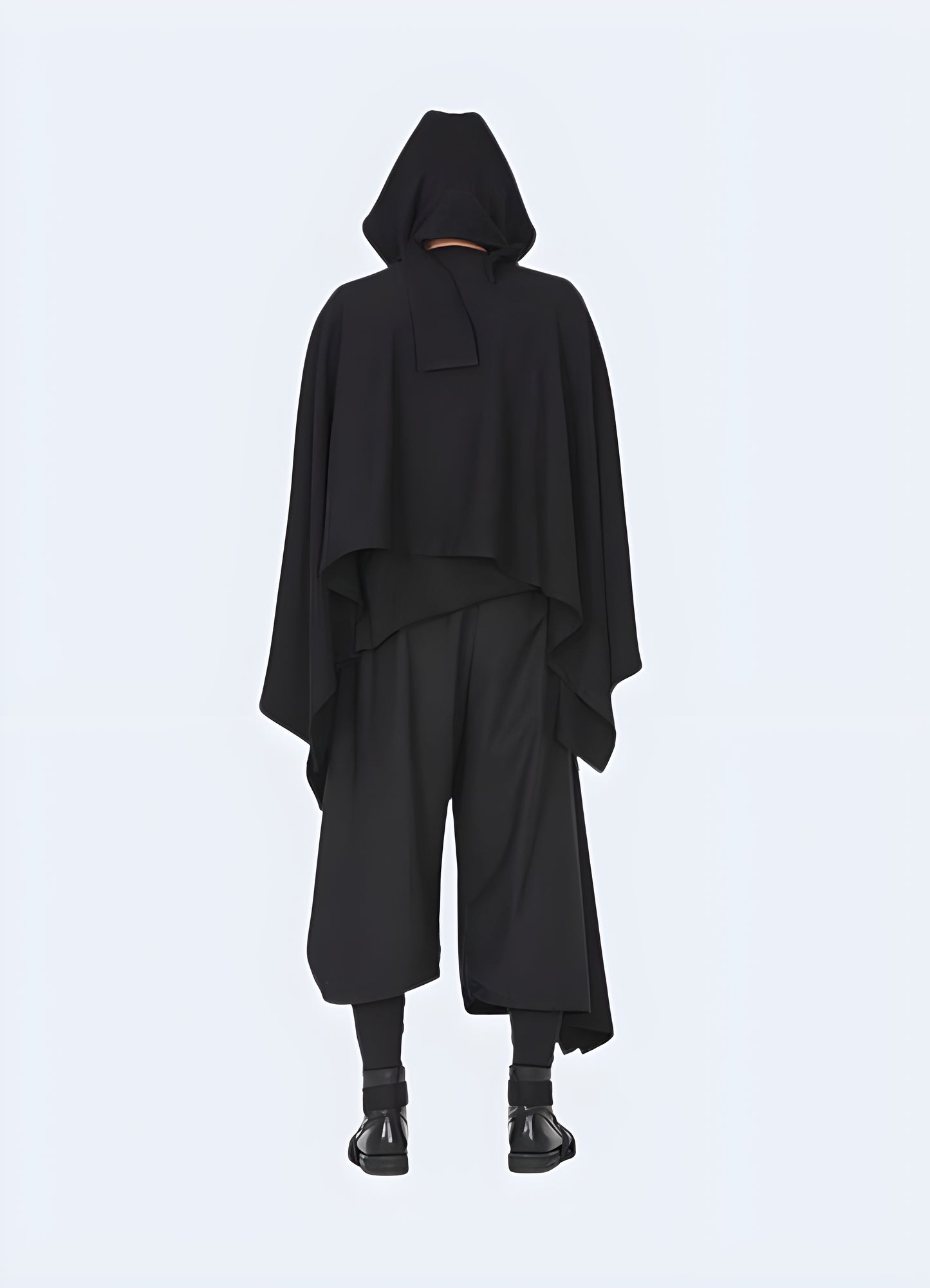 Zip front with snap placket over flap cloak coat with hood.