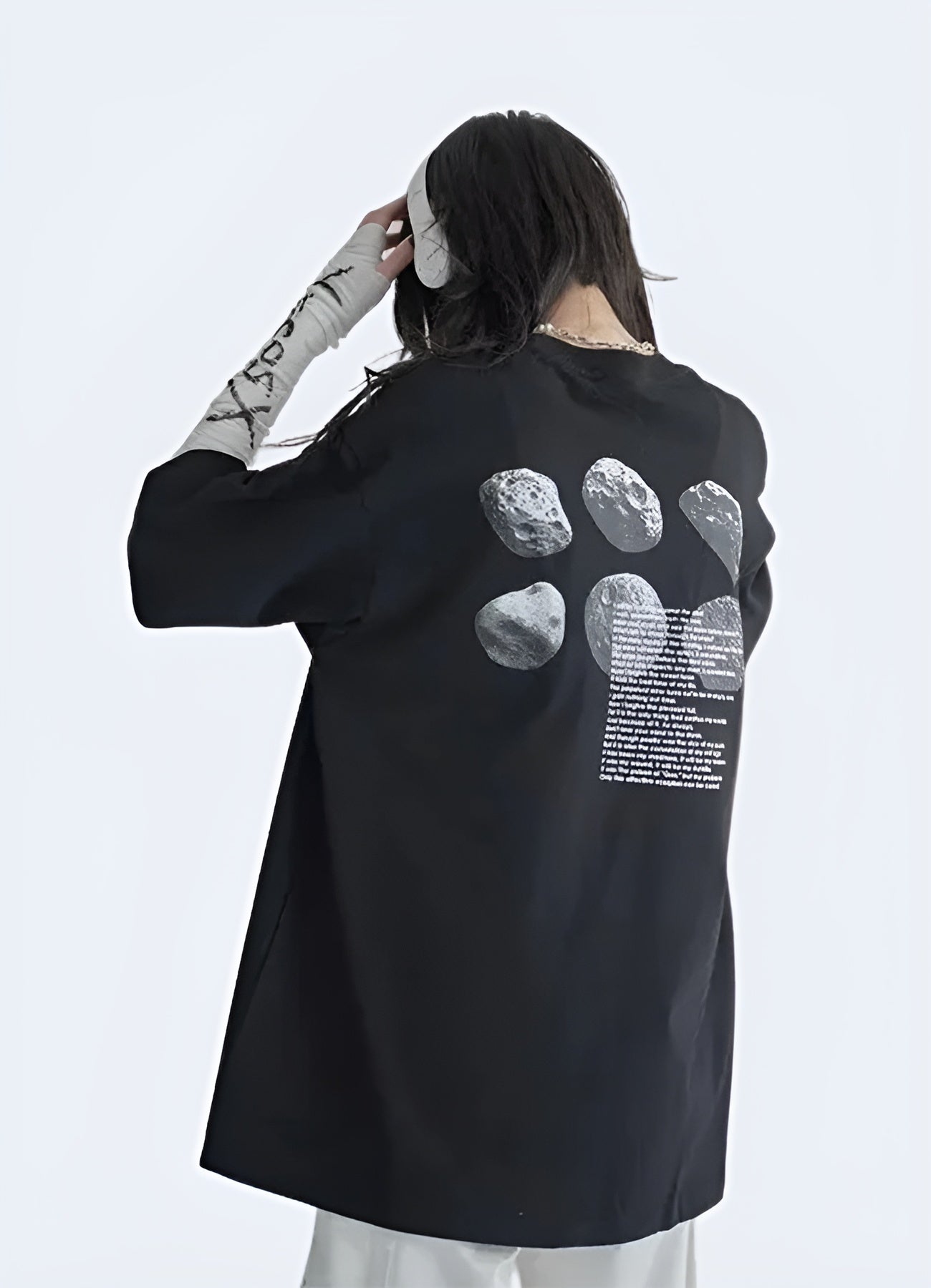 This garment embodies the vintage dystopian shirt trend. 