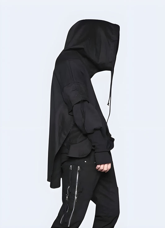 Adjustable hood hooded poncho sweater side view.