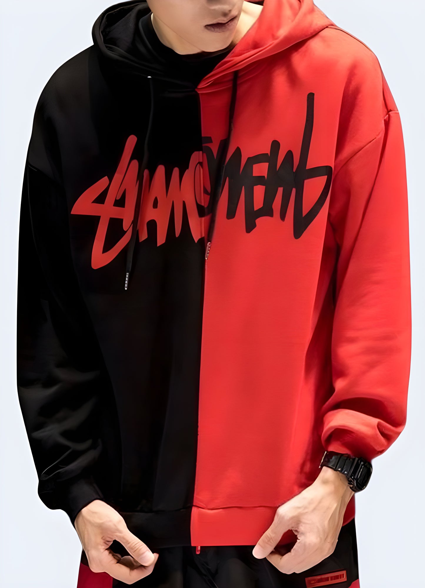 Express your duality in this striking red and black split hoodie. 