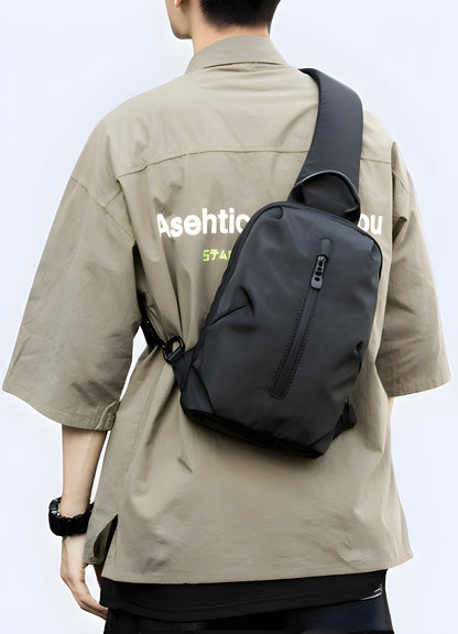 Padded, adjustable shoulder strap, minimalist shoulder bag with secure zip fastening.