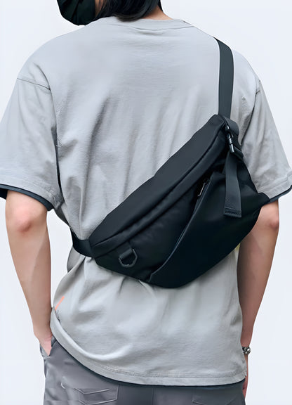 Front view of a man with a streetwear crossbody bag, showcasing its urban style and practicality.