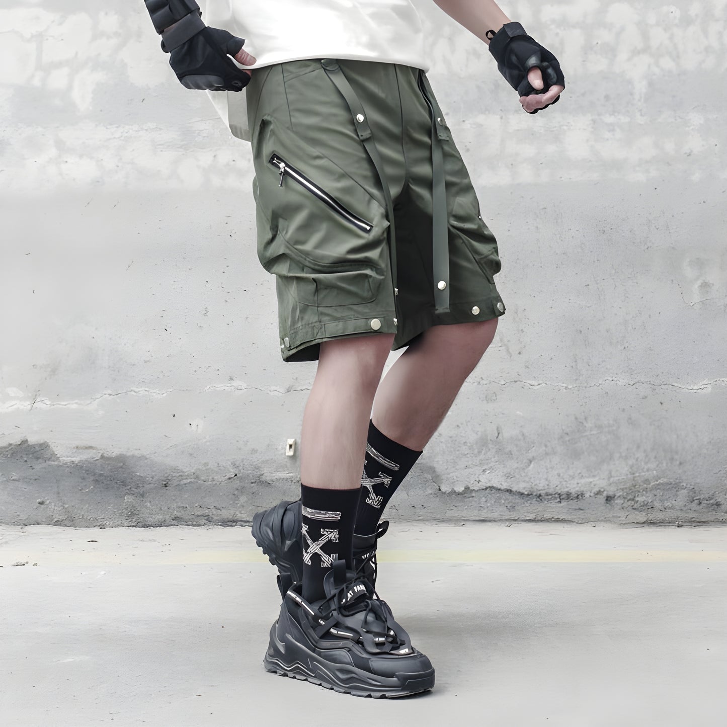 Man wearing technical shorts in green, front view, highlighting the durable and versatile design ideal for contemporary techwear styles in the au.