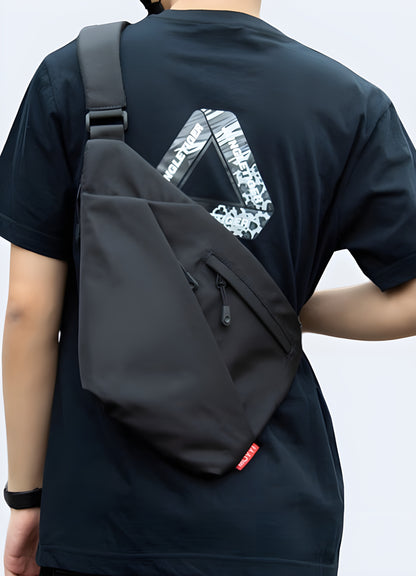 Man wearing an urban sling bag, front view, highlighting its trendy and functional design.