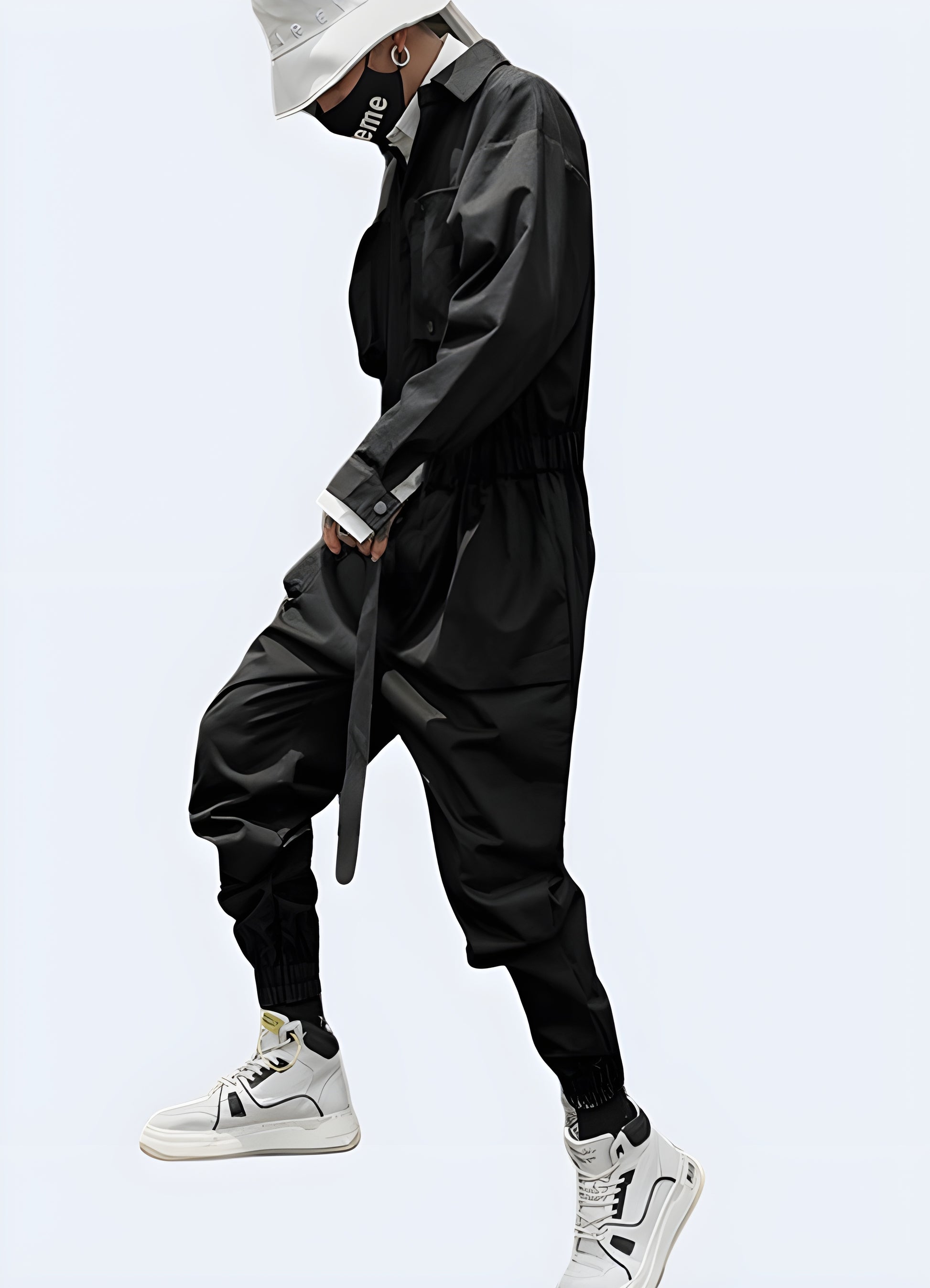 Black cargo overalls with utility pant design.