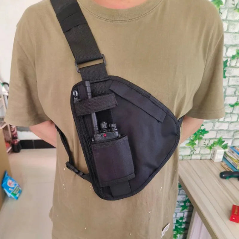 Man wearing a chest sling bag, front view, highlighting the bag's design.