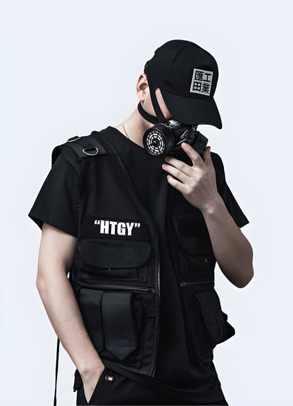 Men wearing HTGY black utility vest front view.