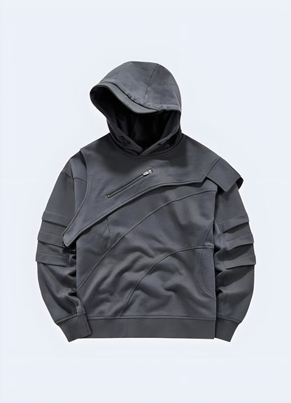 Man wearing a black tech fleece hoodie, front view. This modern hoodie features a sleek, minimalist design with high-performance fabric for warmth and comfort. Perfect for urban and techwear styles, it combines functionality with a futuristic aesthetic.