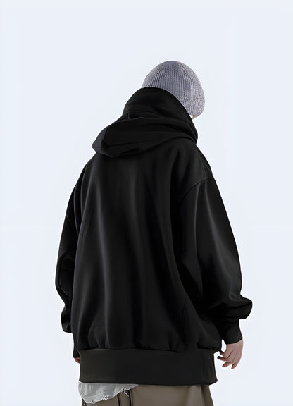 This oversized hoodie transcends trends, offering a relaxed fit for all.