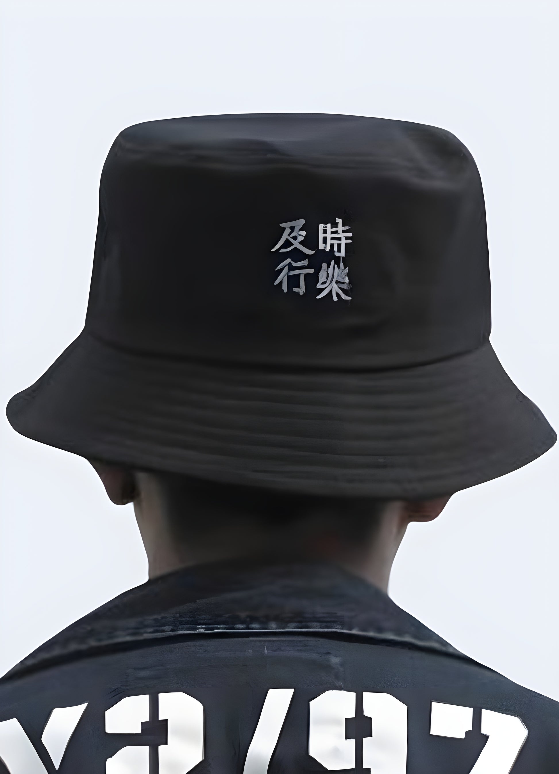 At first glance, the pristine white Kanji lettering that graces the front of the hat reveals its true identity.